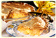 A slice of fruit pie on a plate